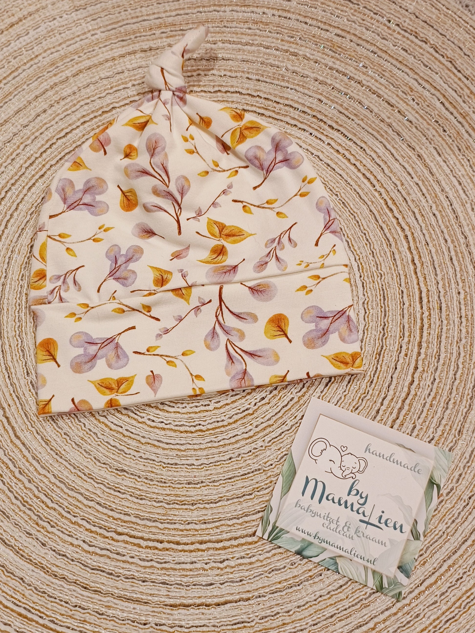 Baby knoopmutsje blaadjes