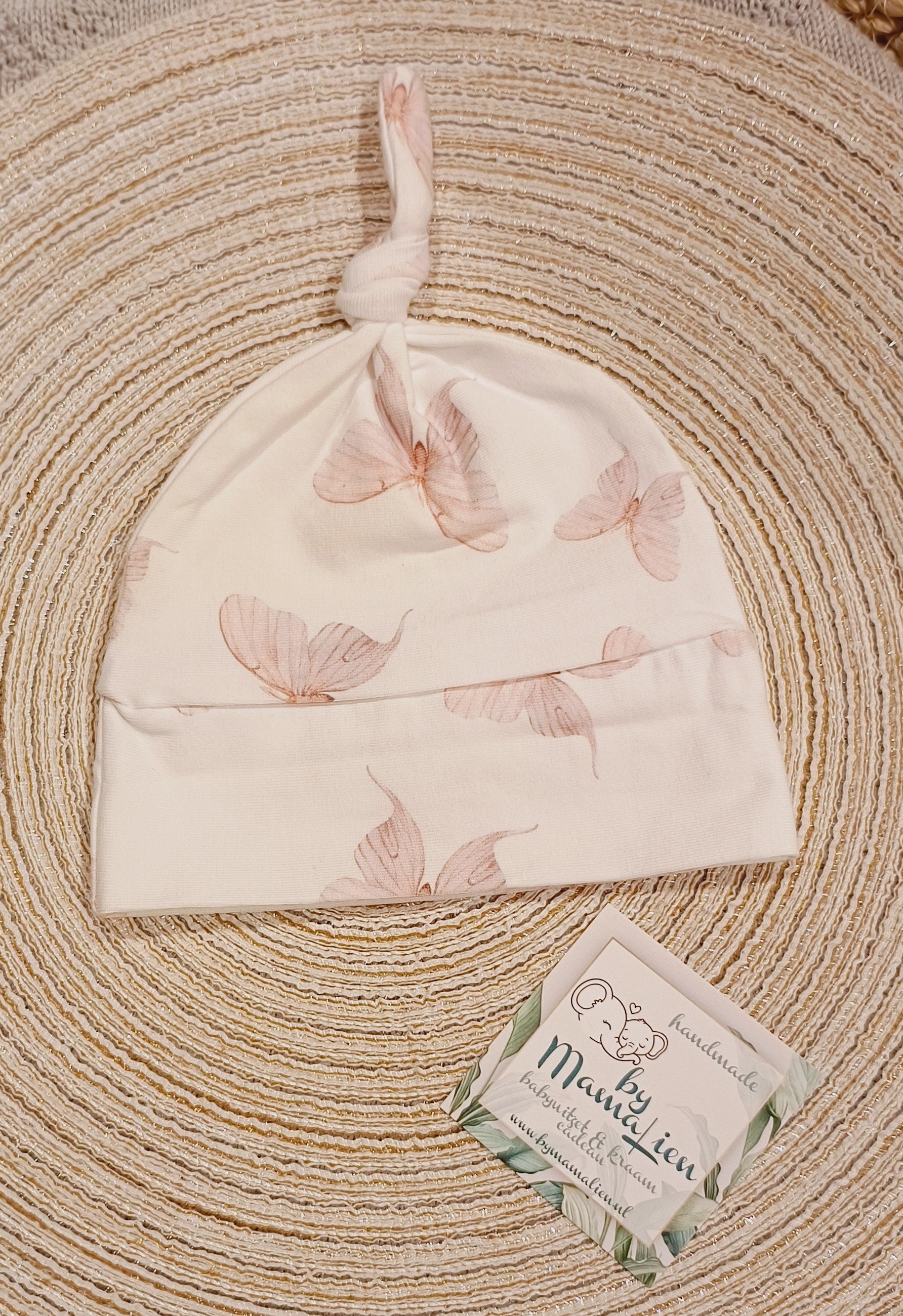 Baby knoopmutsje vlinders