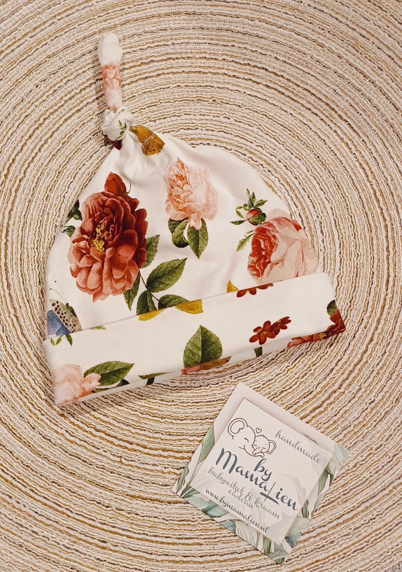 Baby knoopmutsje bloemen