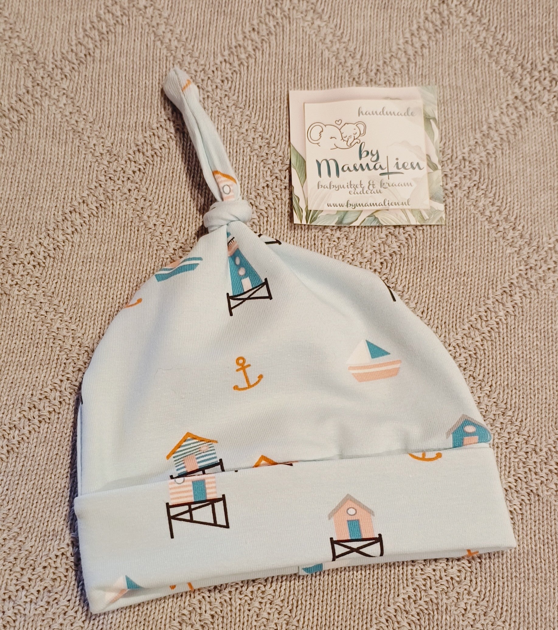 Baby knoopmutsje strandhuisjes