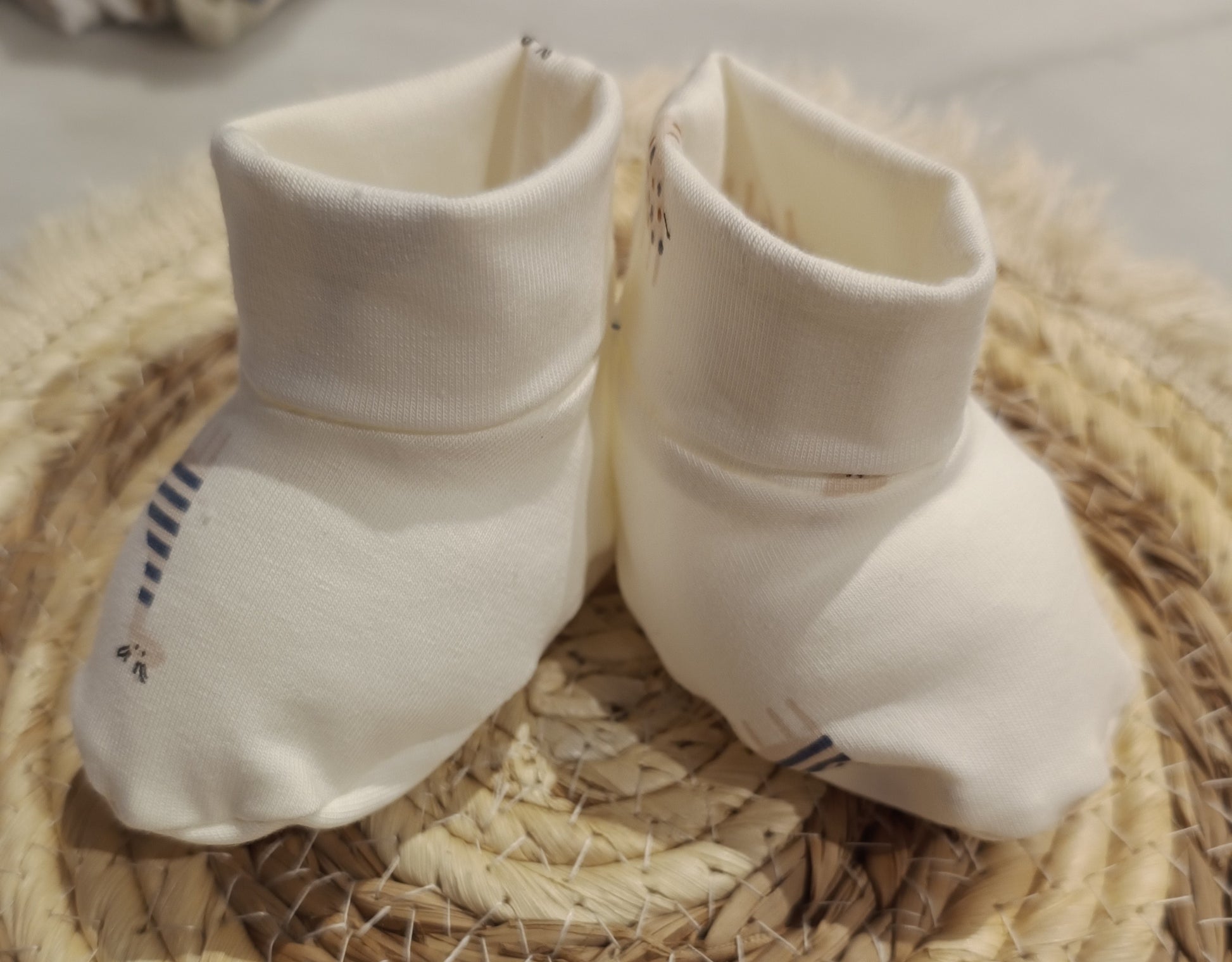 Baby slofjes crème girafjes
