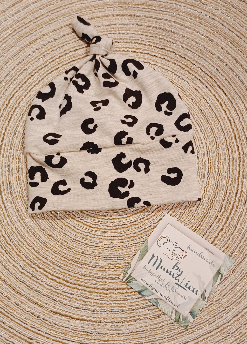 Baby knoopmutsje kleine stippen