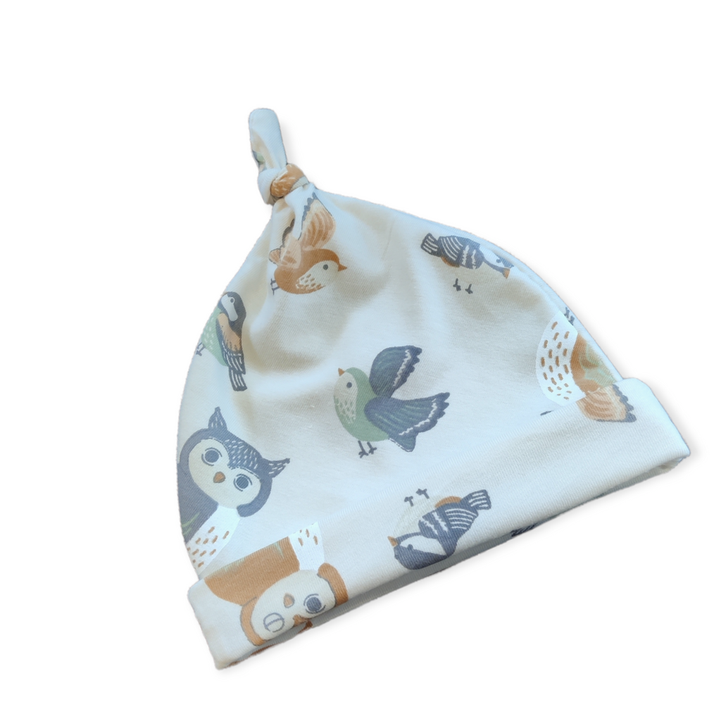 Baby knoopmutsje uiltjes