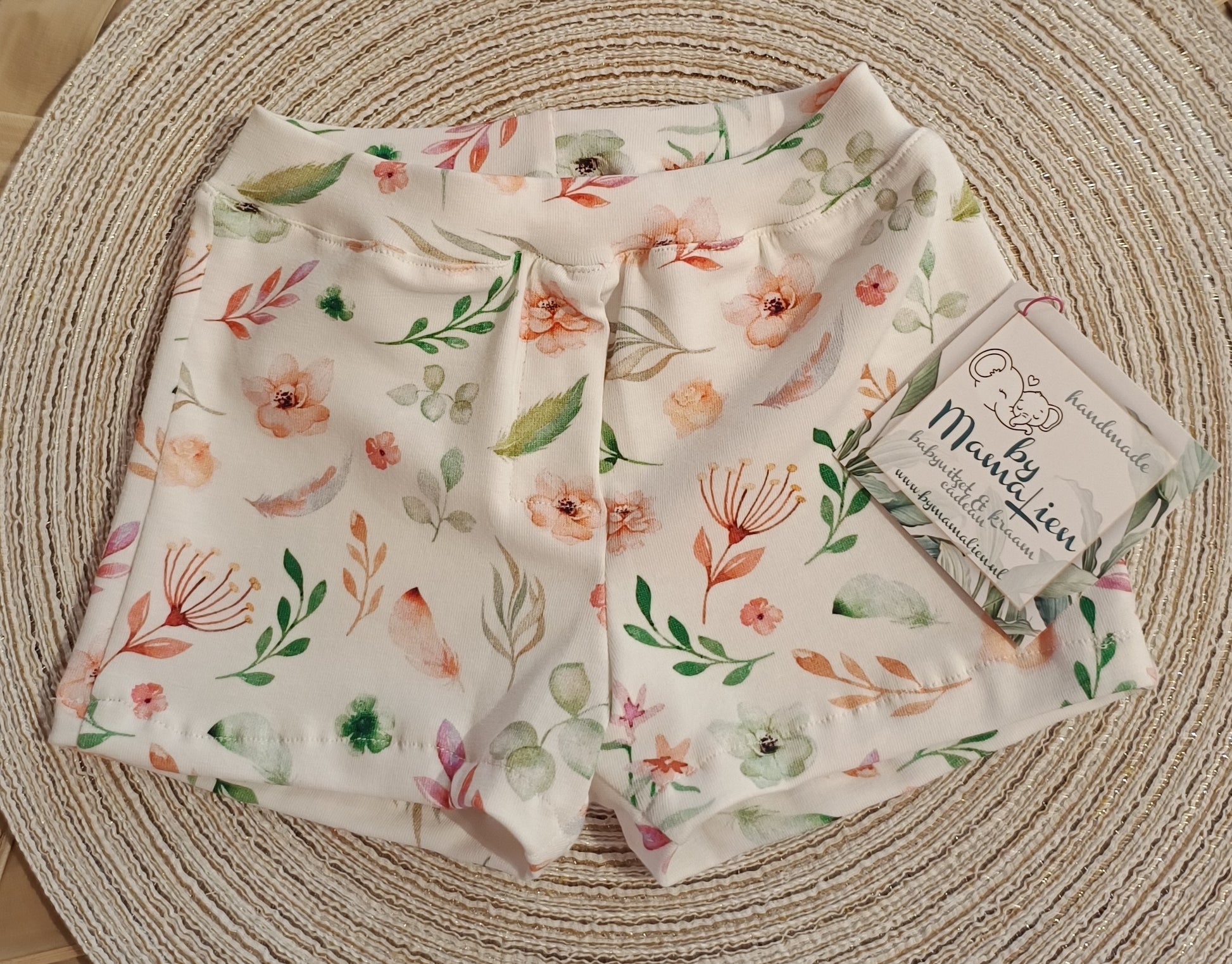 Baby korte broek maat 62 roze bloemen